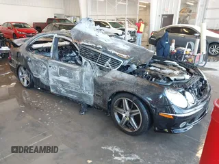 2003 Mercedes-Benz E-Class 5.5L AMG with VIN WDBUF76J73A327193, listed as a IAAI auction lot 41282703 with 1 mi miles. Bid and sale history available at carsss.com. Image 1.