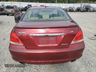 2005 Acura RL z VIN JH4KB16515C007796, wystawiony jako Copart lot #55977605 z przebiegiem 167 320 mil mil oraz Szkoda całkowita • Salvage title. Historia ofert i sprzedaży dostępna na DreamBid. Obrazek 6.