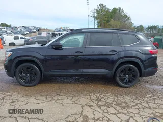 2022 Volkswagen Atlas SE z VIN 1V2HR2CA1NC549008, wystawiony jako IAAI lot #41851901 z przebiegiem 39 892 mil mil oraz . Historia ofert i sprzedaży dostępna na DreamBid. Obrazek 14.