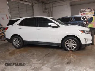 2019 Chevrolet Equinox LT z VIN 2GNAXUEV0K6182506, wystawiony jako IAAI lot #41377011 z przebiegiem 96 085 mil mil oraz . Historia ofert i sprzedaży dostępna na DreamBid. Obrazek 14.