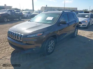 2014 Jeep Cherokee Latitude with VIN 1C4PJLCS4EW148960, listed as a IAAI auction lot 41111496 with 177,819 mi miles. Bid and sale history available at carsss.com. Image 19.