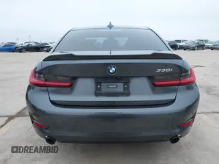 2021 BMW 3 Series 330i with VIN 3MW5R1J09M8C15403, listed as a IAAI auction lot 41892341 with 30,975 mi miles and . Bid and sale history available at carsss.com. Image 16.
