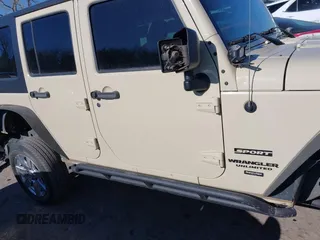 2012 Jeep Wrangler Unlimited Sport z VIN 1C4BJWDG8CL102486, wystawiony jako IAAI lot #41386649 z przebiegiem 156 993 mil mil oraz . Historia ofert i sprzedaży dostępna na DreamBid. Obrazek 13.