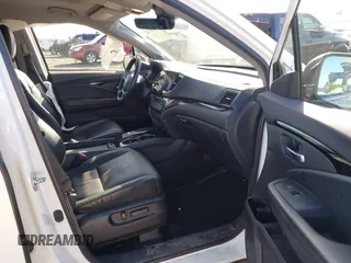 2021 Honda Pilot Touring 8-Passenger with VIN 5FNYF6H92MB031782, listed as a IAAI auction lot 42087322 with 70,062 mi miles and . Bid and sale history available at DreamBid. Image 5.