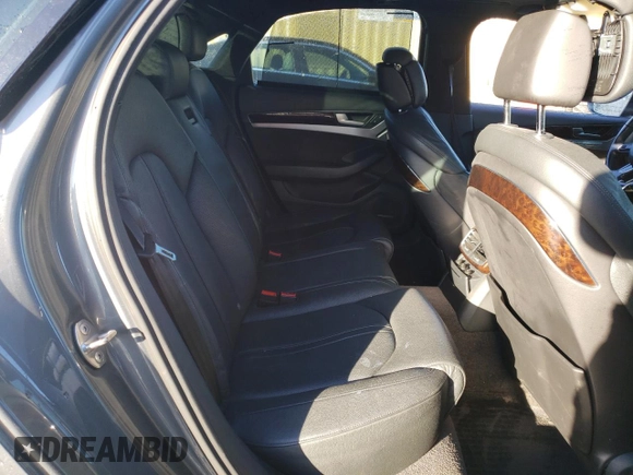 2015 Audi A8 z VIN WAUJGAFD9FN022023, wystawiony jako Copart lot #86048354 z przebiegiem Nie podano mil oraz Szkoda całkowita • Salvage title. Historia ofert i sprzedaży dostępna na DreamBid. Obrazek 10.