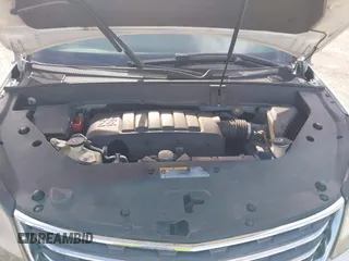 2013 Chevrolet Traverse LT z VIN 1GNKRGKD8DJ130025, wystawiony jako IAAI lot #41696382 z przebiegiem 161 382 mil mil oraz . Historia ofert i sprzedaży dostępna na DreamBid. Obrazek 10.