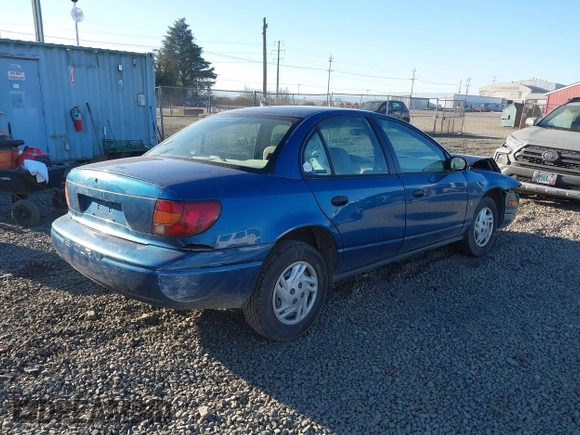 2002 Saturn SL z VIN 1G8ZF52802Z134506, wystawiony jako IAAI lot #41461865 z przebiegiem 210 886 mil mil oraz . Historia ofert i sprzedaży dostępna na DreamBid. Obrazek 4.