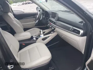 2021 Kia Telluride S with VIN 5XYP64HC8MG127498, listed as a IAAI auction lot 42371890 with 100,748 mi miles and . Bid and sale history available at DreamBid. Image 5.