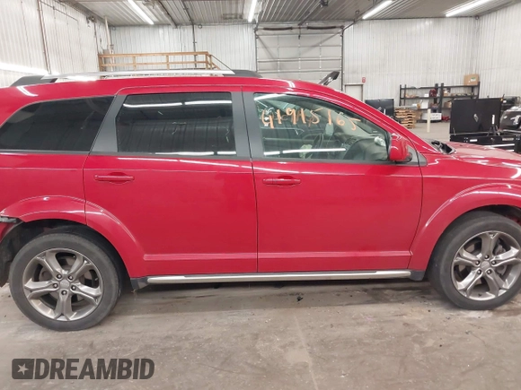 2016 Dodge Journey Crossroad Plus z VIN 3C4PDDGGXGT245673, wystawiony jako IAAI lot #41915165 z przebiegiem 124 861 mil mil oraz . Historia ofert i sprzedaży dostępna na DreamBid. Obrazek 14.