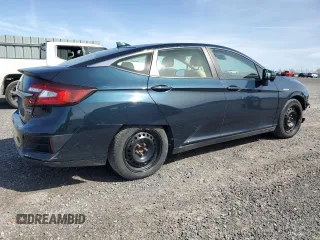 2018 Honda Clarity Touring z VIN JHMZC5F35JC800286, wystawiony jako Copart lot #55320545 z przebiegiem 122 548 mil mil oraz Czysty tytuł • Clean title. Historia ofert i sprzedaży dostępna na DreamBid. Obrazek 3.