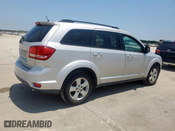 2012 Dodge Journey SXT with VIN 3C4PDCBG1CT134375, listed as a Copart auction lot 61059305 with 165,913 mi miles and Salvage title. Bid and sale history available at DreamBid. Image 3.
