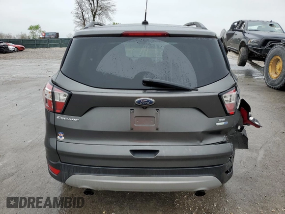 2018 Ford Escape SE with VIN 1FMCU9GD2JUA48491, listed as a Copart auction lot 51832565 with 207,422 mi miles and Salvage Title. Bid and sale history available at carsss.com. Image 6.