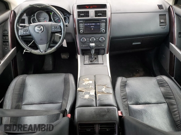 2015 Mazda CX-9 Grand Touring z VIN JM3TB2DA3F0452322, wystawiony jako Copart lot #57821285 z przebiegiem 147 610 mil mil oraz Czysty tytuł • Clean title. Historia ofert i sprzedaży dostępna na DreamBid. Obrazek 8.