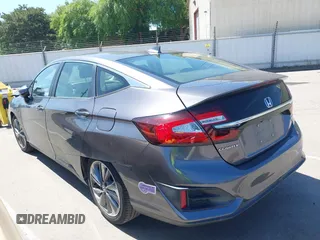 2018 Honda Clarity Touring z VIN JHMZC5F33JC021811, wystawiony jako IAAI lot #42272808 z przebiegiem 82 414 mil mil oraz . Historia ofert i sprzedaży dostępna na DreamBid. Obrazek 14.