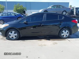 2014 Kia Forte LX with VIN KNAFK4A60E5245046, listed as a IAAI auction lot 41775035 with 203,001 mi miles. Bid and sale history available at carsss.com. Image 14.