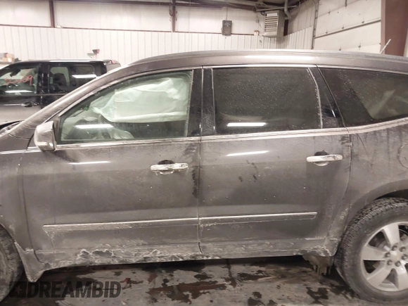 2015 Chevrolet Traverse LTZ with VIN 1GNKVJKD8FJ360899, listed as a IAAI auction lot 41634924 with 165,835 mi miles and . Bid and sale history available at DreamBid. Image 14.