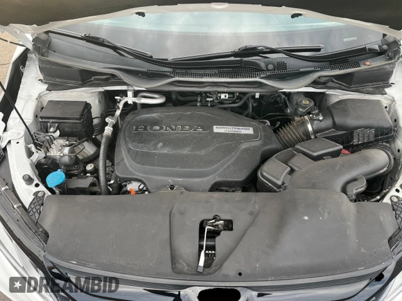 2019 Honda Odyssey Touring z VIN 5FNRL6H86KB053432, wystawiony jako Copart lot #65482425 z przebiegiem 87 470 mil mil oraz Szkoda całkowita • Salvage title. Historia ofert i sprzedaży dostępna na DreamBid. Obrazek 7.