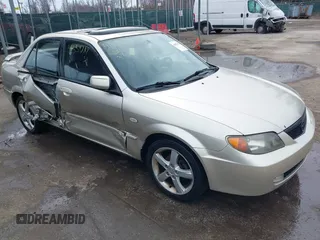 2003 Mazda Protege DX with VIN JM1BJ226031138221, listed as a IAAI auction lot 41554217 with 167,925 mi miles and . Bid and sale history available at DreamBid. Image 1.