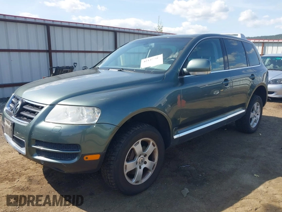 2004 Volkswagen Touareg with VIN WVGEM77L54D061132, listed as a IAAI auction lot 42127905 with 146,801 mi miles and . Bid and sale history available at DreamBid. Image 2.
