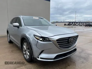 2017 Mazda CX-9 Grand Touring z VIN JM3TCADY7H0136915, wystawiony jako Copart lot #57106855 z przebiegiem 135 872 mil mil oraz Czysty tytuł • Clean title. Historia ofert i sprzedaży dostępna na DreamBid. Obrazek 1.