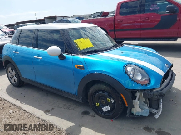 2017 MINI Hardtop 4 Door Cooper with VIN WMWXU1C53H2E17614, listed as a IAAI auction lot 41686204 with 53,409 mi miles and . Bid and sale history available at DreamBid. Image 14.