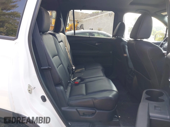 2019 Honda Passport EX-L with VIN 5FNYF8H56KB029748, listed as a IAAI auction lot 42405028 with 59,009 mi miles and . Bid and sale history available at DreamBid. Image 8.