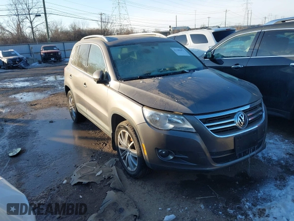 2010 Volkswagen Tiguan SEL with VIN WVGBV7AX0AW000279, listed as a IAAI auction lot 41389452 with 87,258 mi miles and . Bid and sale history available at DreamBid. Image 1.