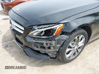 2015 Mercedes-Benz C with VIN 55SWF4KBXFU040013, listed as a IAAI auction lot 42136894 with 123,460 mi miles. Bid and sale history available at carsss.com. Image 6.