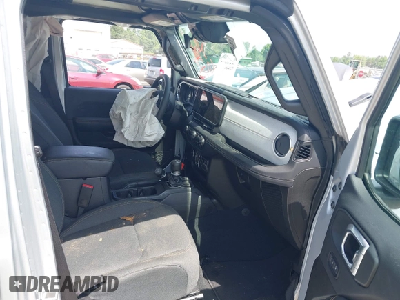 2024 Jeep Wrangler Sahara with VIN 1C4RJXP60RW292136, listed as a IAAI auction lot 42280063 with 26,701 mi miles and . Bid and sale history available at DreamBid. Image 5.