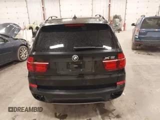 2012 BMW X5 35i with VIN 5UXZV4C55CL990510, listed as a IAAI auction lot 41849293 with 117,522 mi miles and . Bid and sale history available at DreamBid. Image 16.