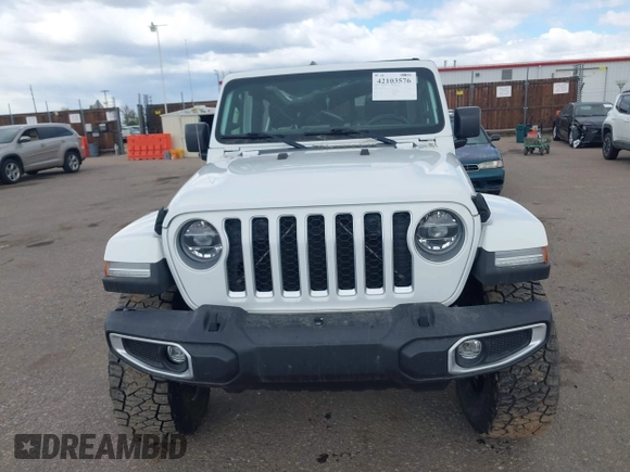 2021 Jeep Gladiator High Altitude with VIN 1C6HJTFG2ML567988, listed as a IAAI auction lot 42103576 with 74,849 mi miles and . Bid and sale history available at DreamBid. Image 12.