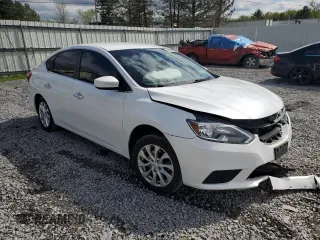 2018 Nissan Sentra SV z VIN 3N1AB7AP8JY249921, wystawiony jako Copart lot #55950335 z przebiegiem 57 560 mil mil oraz Szkoda całkowita • Salvage title. Historia ofert i sprzedaży dostępna na DreamBid. Obrazek 4.