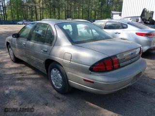 1999 Chevrolet Lumina with VIN 2G1WL52M3X9189217, listed as a IAAI auction lot 42082029 with 211,500 mi miles. Bid and sale history available at carsss.com. Image 3.