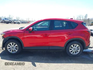 2015 Mazda CX-5 Sport с VIN JM3KE2BE1F0489572, выставлен на аукционе IAAI как лот 42051148 с пробегом 134 405 миль миль и . История ставок и продаж доступна на DreamBid. Изображение 15.