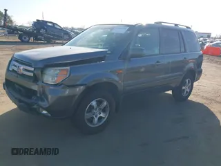 2007 Honda Pilot EX-L with VIN 5FNYF28797B001772, listed as a IAAI auction lot 41320270 with 220,227 mi miles. Bid and sale history available at carsss.com. Image 2.