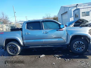 2023 Toyota Tacoma 4WD SR with VIN 3TMCZ5ANXPM543065, listed as a IAAI auction lot 41101092 with 33,792 mi miles. Bid and sale history available at carsss.com. Image 13.