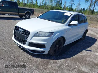 2014 Audi Q7 3.0T S line Prestige with VIN WA1DGAFE4ED008263, listed as a IAAI auction lot 41736972 with 135,080 mi miles. Bid and sale history available at carsss.com. Image 2.