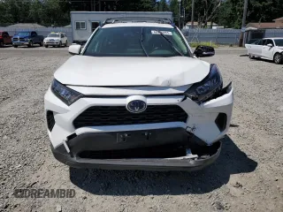 2021 Toyota RAV4 Hybrid LE with VIN JTMM6RFVXMD018561, listed as a Copart auction lot 60475965 with 56,074 mi miles and Salvage title. Bid and sale history available at DreamBid. Image 5.