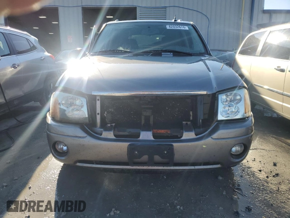 2005 GMC Envoy SLT with VIN 1GKDS13SX52322725, listed as a Copart auction lot 82032674 with 249,288 mi miles and Salvage Title. Bid and sale history available at carsss.com. Image 5.