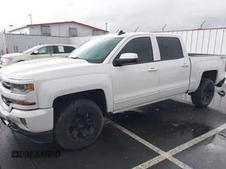 2018 Chevrolet Silverado 1500 LT with VIN 3GCUKREC5JG595959, listed as a IAAI auction lot 41608507 with 117,824 mi miles. Bid and sale history available at carsss.com. Image 2.