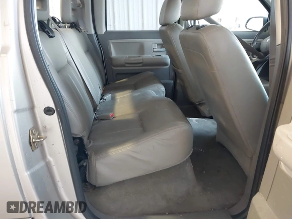 2005 Dodge Dakota Laramie with VIN 1D7HW58N15S159061, listed as a IAAI auction lot 41898306 with 114,288 mi miles and . Bid and sale history available at DreamBid. Image 8.