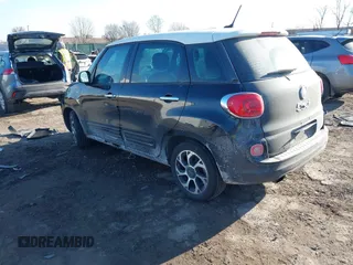 2014 FIAT 500L Easy with VIN ZFBCFABH1EZ002527, listed as a IAAI auction lot 41451693 with 133,488 mi miles and . Bid and sale history available at DreamBid. Image 3.