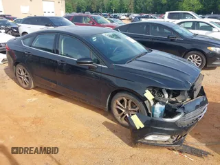 2017 Ford Fusion SE z VIN 3FA6P0H75HR226317, wystawiony jako IAAI lot #42278370 z przebiegiem 94 760 mil mil oraz . Historia ofert i sprzedaży dostępna na DreamBid. Obrazek 1.