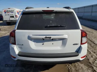 2016 Jeep Compass High Altitude Edition with VIN 1C4NJDEB5GD708445, listed as a Copart auction lot 41984955 with 104,285 mi miles and Salvage Title. Bid and sale history available at carsss.com. Image 6.