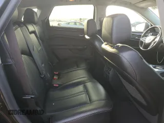 2013 Cadillac SRX Performance Collection с VIN 3GYFNHE39DS506349, выставлен на аукционе Copart как лот 63289244 с пробегом 111 673 миль миль и Списание • Salvage title. История ставок и продаж доступна на DreamBid. Изображение 11.