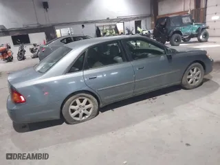2000 Toyota Avalon XL with VIN 4T1BF28B3YU096957, listed as a IAAI auction lot 41296980 with 186,550 mi miles. Bid and sale history available at carsss.com. Image 4.