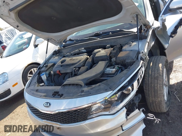2016 Kia Optima LX with VIN 5XXGT4L34GG078857, listed as a IAAI auction lot 41819971 with 112,963 mi miles. Bid and sale history available at carsss.com. Image 10.