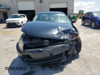 2012 Volkswagen Jetta TDI w/Premium z VIN 3VWLL7AJ3CM036834, wystawiony jako Copart lot #51161225 z przebiegiem 181 109 mil mil oraz Szkoda całkowita • Salvage title. Historia ofert i sprzedaży dostępna na DreamBid. Obrazek 5.