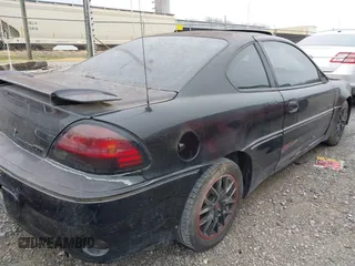 2000 Pontiac Grand Am GT with VIN 1G2NW12E2YM744579, listed as a IAAI auction lot 41098582 with 186,205 mi miles. Bid and sale history available at carsss.com. Image 4.