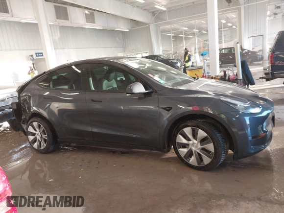 2023 Tesla Model Y Long Range with VIN 7SAYGDEE5PA033341, listed as a IAAI auction lot 41379625 with Not provided miles and . Bid and sale history available at DreamBid. Image 13.